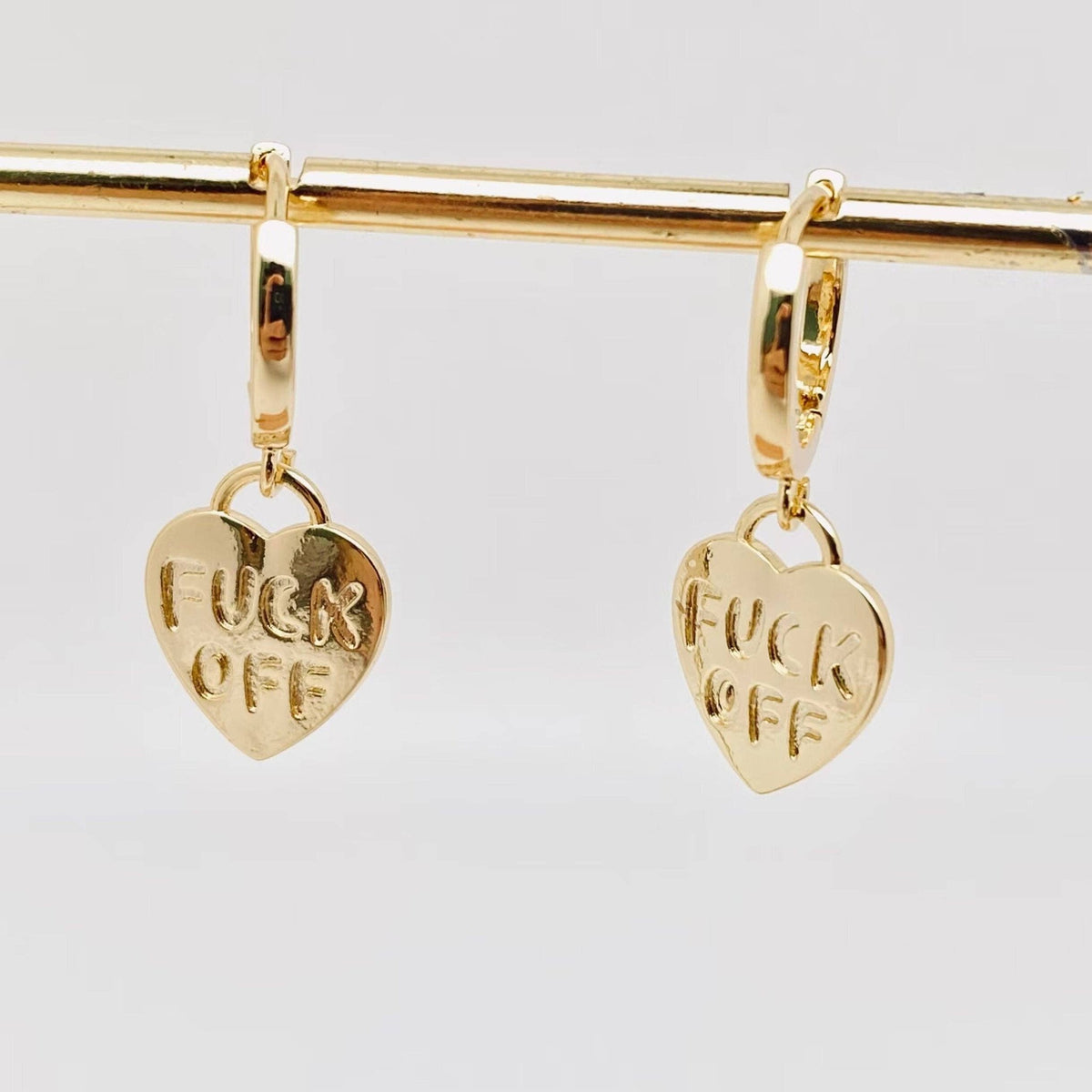 "Fuck off" Heart-shaped Gold Plated Huggie Earrings: Silver - ivyandlavyboutique Mio Queena