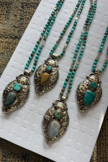 Happy Buggy Drop Necklace on Turquoise