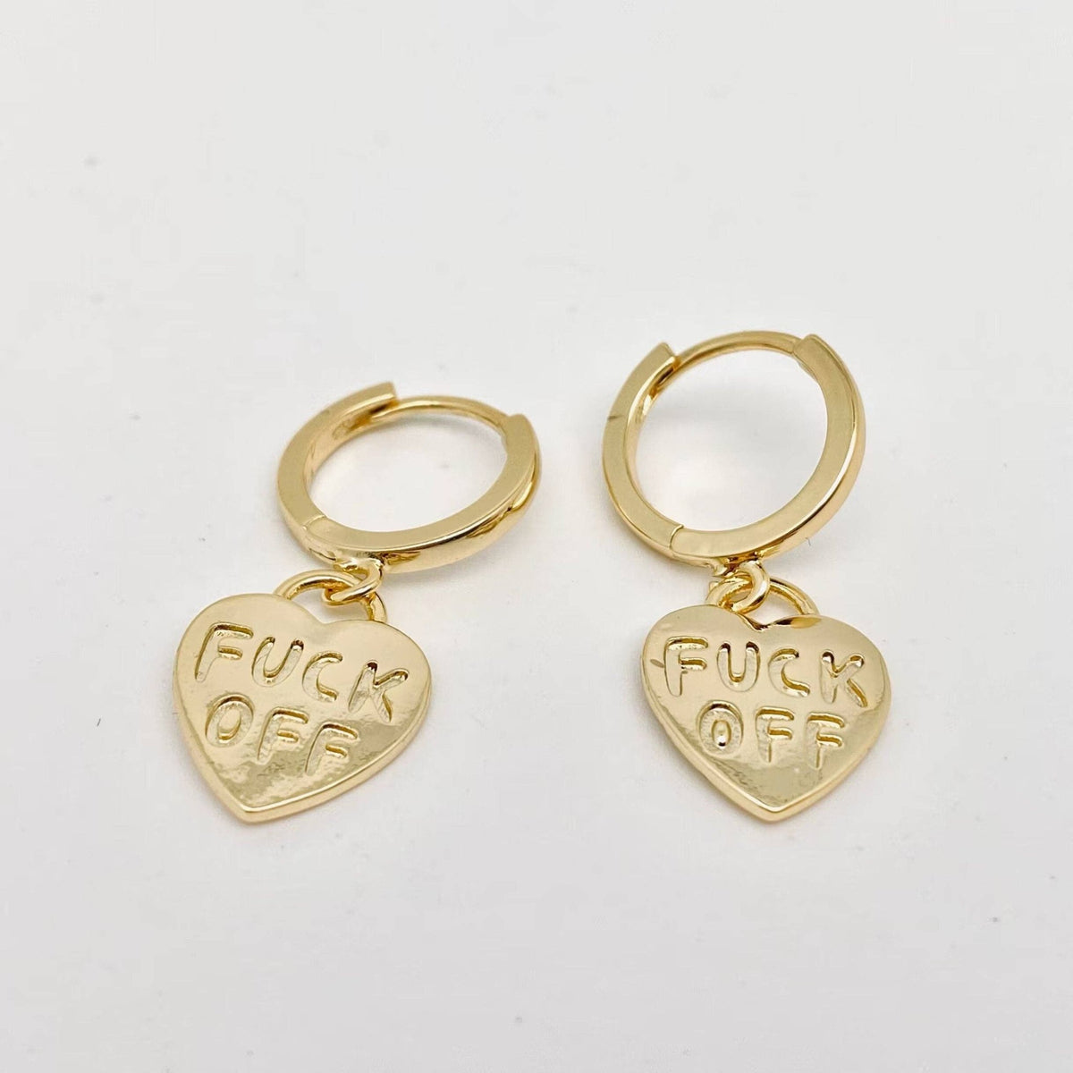 "Fuck off" Heart-shaped Gold Plated Huggie Earrings: Silver - ivyandlavyboutique Mio Queena