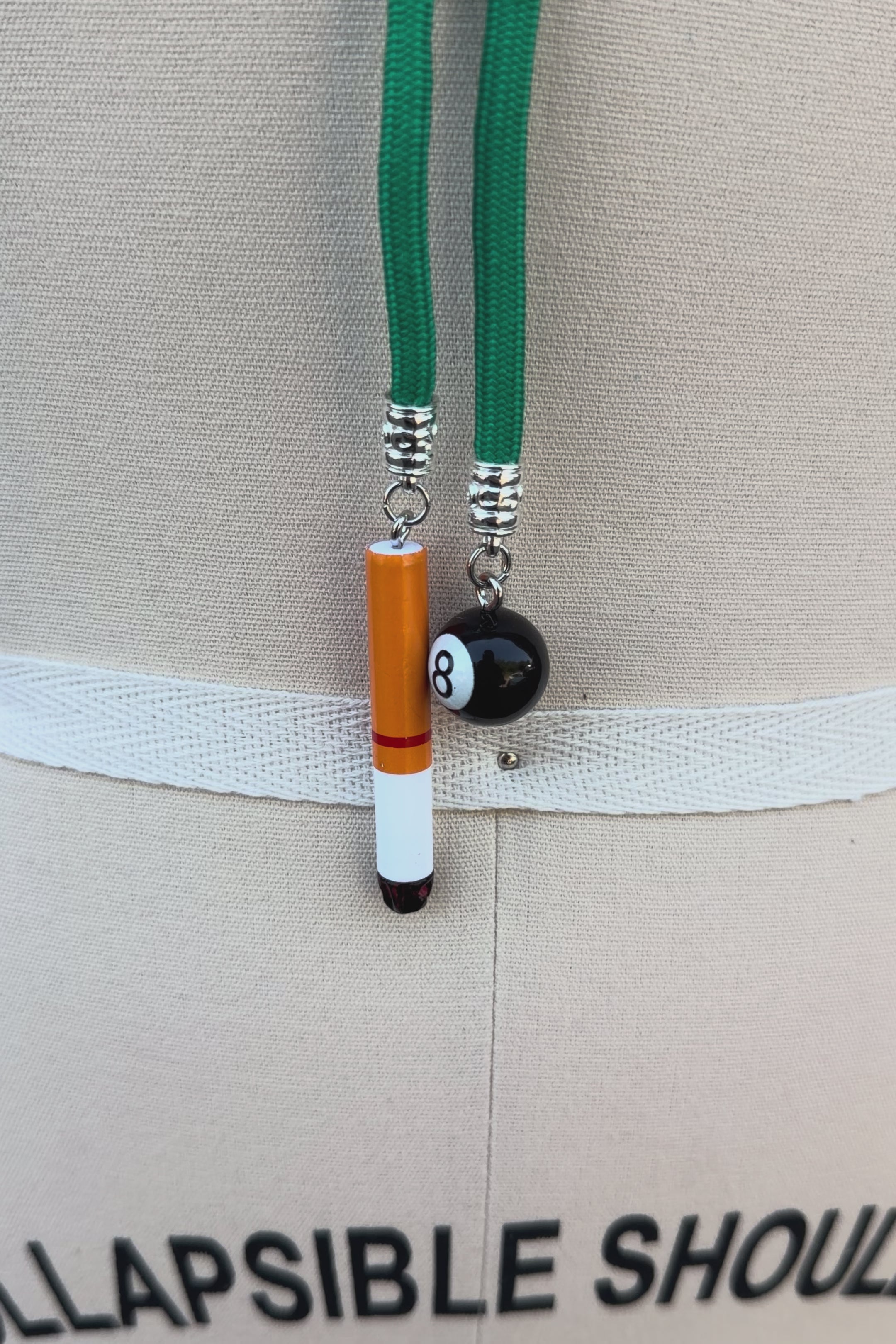 Cat scratch fever shoe tie necklace